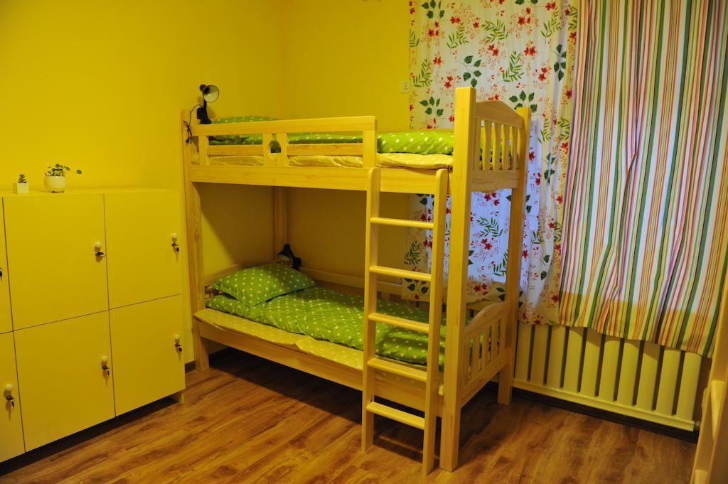Dalian Buzz Light Year Youth Hostel Номер фото